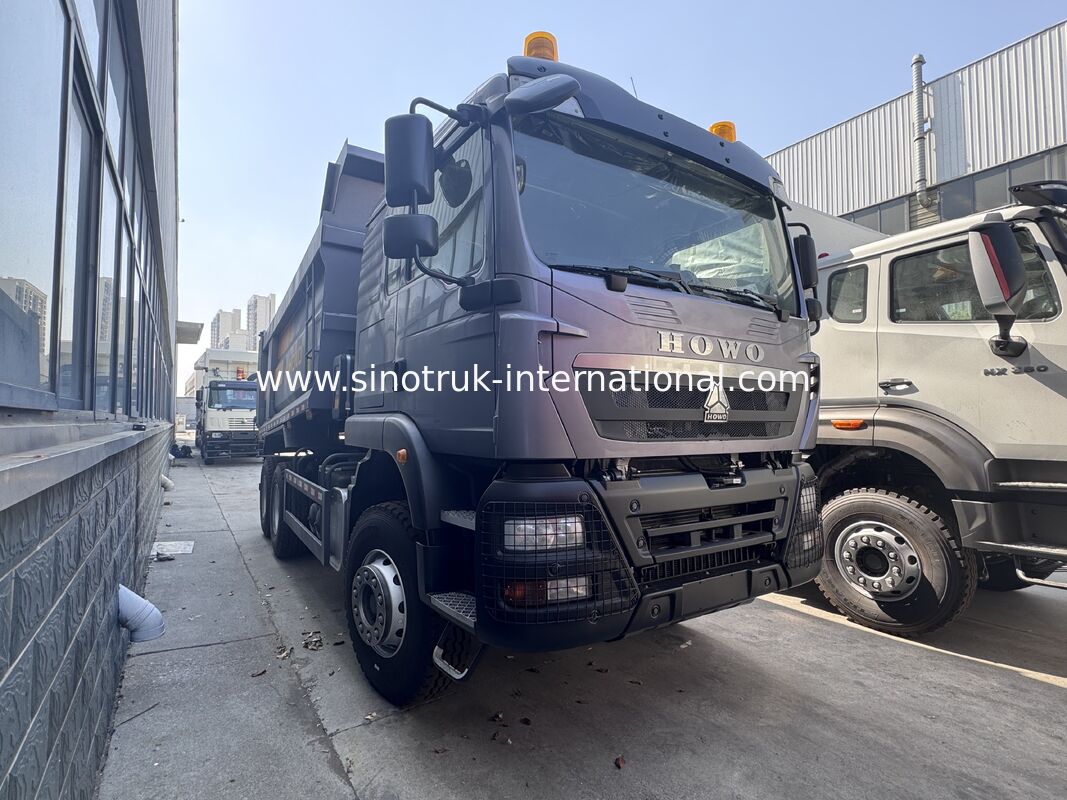 SINOTRUK HOWO TX Modelo 371HP LHD camión de descarga con tirador 6X4 Con luces de advertencia tipo U Color gris