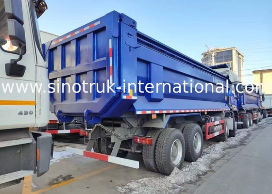 RHD 8×4 12 ruedas ZZ3317V3847B1R Alta potencia Bajo consumo de combustible380HP Camión de retroceso HOWO azul
